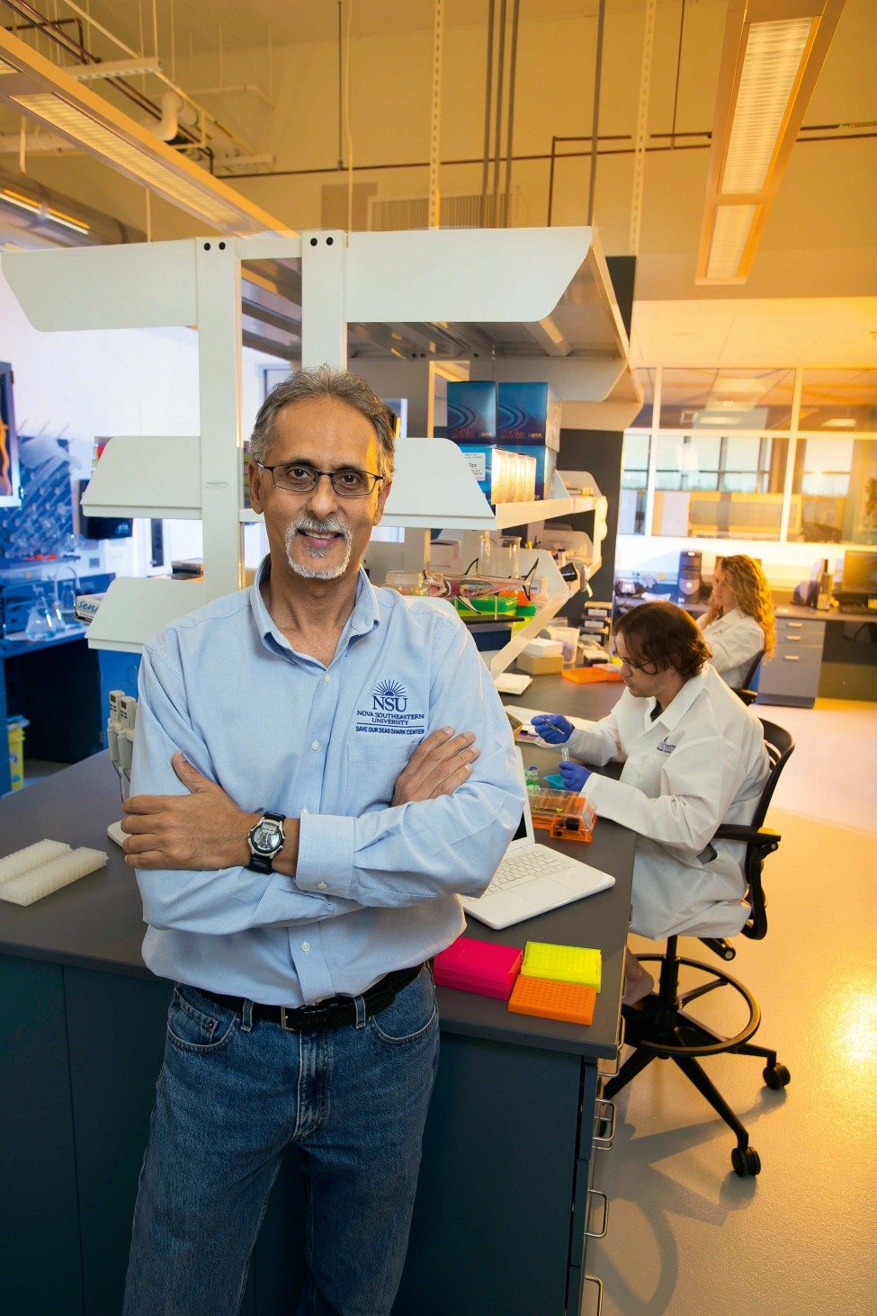 Professor Mahmood Shivji and other researchers working at the SOSSRC laboratory break down the genetic blueprint that makes a shark a shark.<br />
Photo by Nova Southeastern University